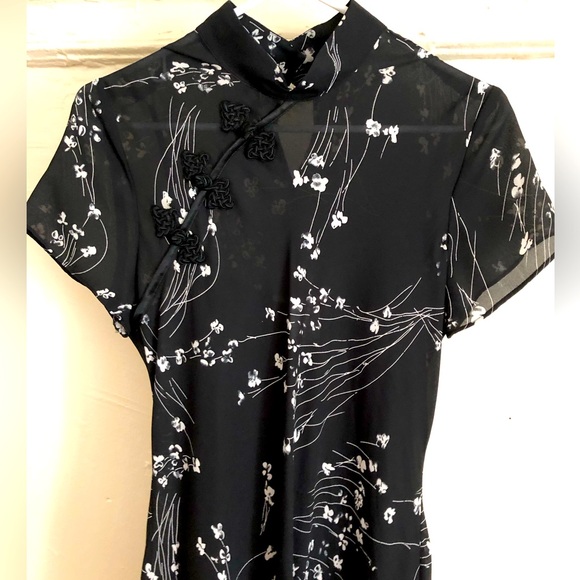 Ronni Nicole Dresses & Skirts - Ronni Nicole Maxi dress black with white flowers.